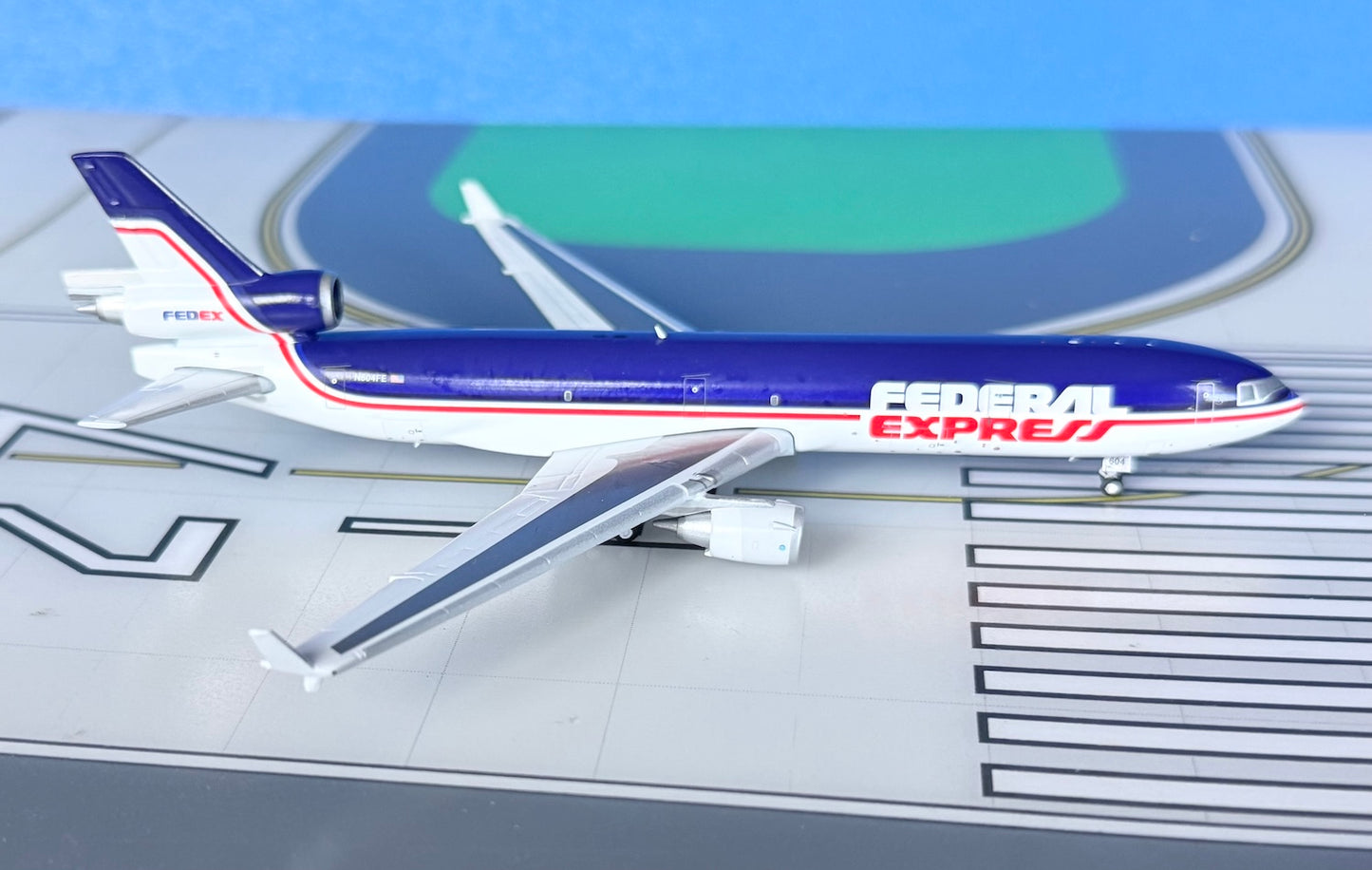 Federal Express McD Douglas MD-11F N604FE 1990's colors 1:400 diecast JC Wings